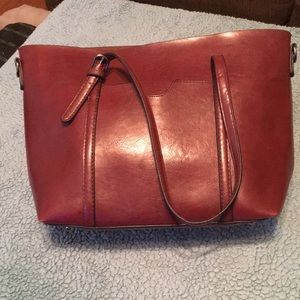 Custom Leather tote with zipper. 10”deep, Top 15 1/5”long, 12”long, 4 1/5 wide.
